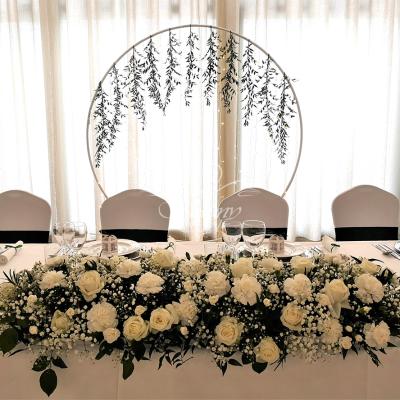 Ścianka weselna złote koło za Parą Młodą w Hotelu Amaryllis